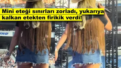 Sahneye mini etekle çıkmıştı, yukarıya kalkan etekten kalçaları gözüktü!
