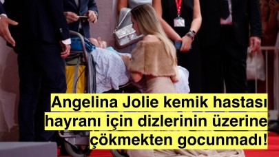 Kemik hastası hayranı için dizlerinin üstüne çöken Angelina Jolie'ye övgü yağdı